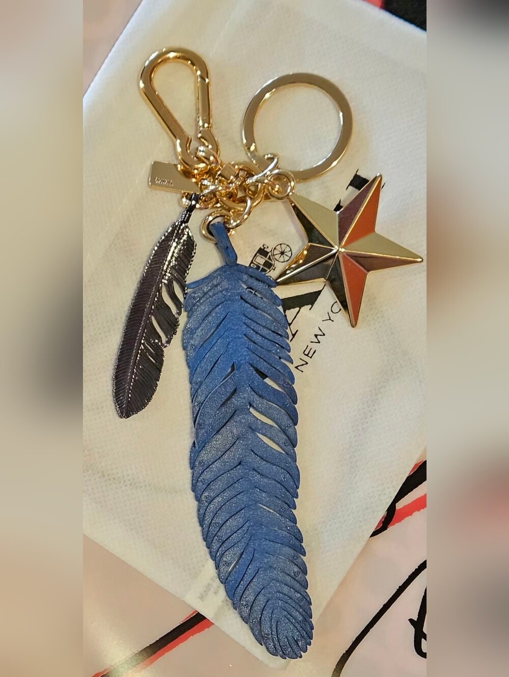 Coach Blue Leather Feather Keychain with Gold Star Charm - Picture 5 of 5